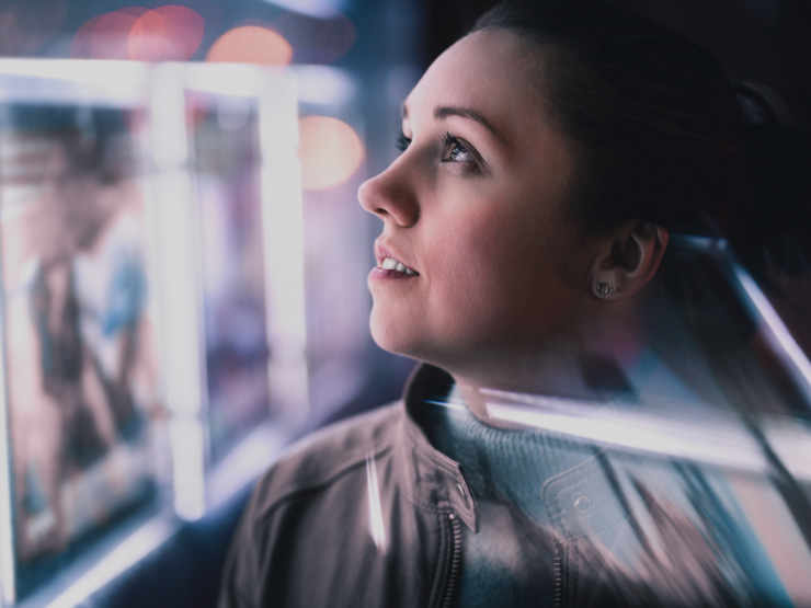 Woman looking at screens